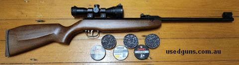 Weihrauch HW30 air rifle, as new. with 4X32 AOE Rifle Scope with Red Green Illuminated Cross, w covers. and 3 packs of ammo. Fired less than 100 rounds.
