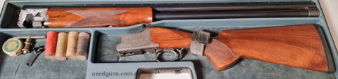 I am not sure what Grade or model this is. It has bright clean barrels and is in good condition. No significant marks on the wood. Buyer pays shipping.