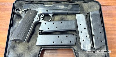 Norinco 45 ACP with case + 4 magazines. Is in good condition. Bluing faded.