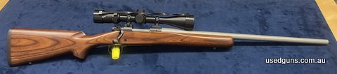 Winchester 25 WSSM. Comes with scope. Redding dies and 100 cases. Brand new swan barrel. This gun is in new condition