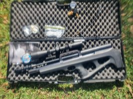 FX Wildcat. This is a later Mk I 22 Air caliber rife and is as new. It has a high-level quality Optisan scope 4-16x44 It also comes with a well-made durable cas