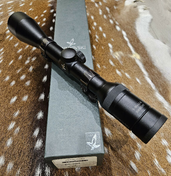 Swarovski habicht 3-10x42 made in Austria with original box. Has 1 small scratch underneath from scope ring. Price includes free freight. Please text or call no