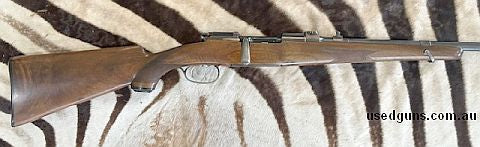 A Model 1950 Mannlicher ( straight bolt handle),big game rifle in the scarce chambering of 9.3x62. All original finish to metal with some thinning due to carryi