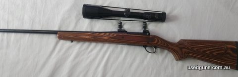 I got this rifle for my son, unfortunately it doesn't fit him. It has an aftermarket barrel and Boyds laminated stock. Comes with Redding dies. The scope is an 