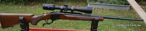 Barrel is 26 inches long. Hardly used and very accurate. Any extra's free.