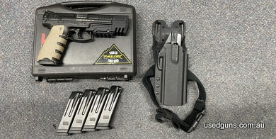 Excellent condition H&K SFP9 in 9mm. Has a threaded barrel with a match weight on the end. Great to control recoil and balance. Has a underbarrel Picatinny rail