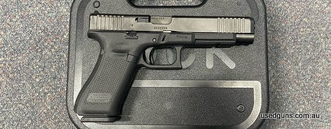 Excellent condition Glock 34 Gen 5 MOS in 9mm. Comes cased with 2 magazines and additional grip modules. Has the Modular Optic System adapter set. $30 freight t
