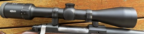 Moving directions on this scope. Overall condition is good has small mark on front objective housing. 2-12x50