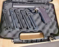 Browning Buck Mark 22LR semi auto pistol in good condition. Comes with case and 5 x 10 round mags.