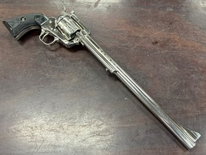 COLT
NEW FRONTIER SAA
NED BUNTLINE COMMEMORATIVE
45 LONG COLT
6 SHOT
12" BARREL
ADJUSTABLE REAR SIGHT
ORIGINAL NICKEL FINISH
HARTFORD ADDRESS ON TOP OF BARREL
SOLID TIMBER DISPLAY CASE
WITH MAROON FELT
ORIGINAL COLT BLACK CHECKERED GRIPS
ALL MARKINGS ON PISTOL ARE VERY CLEAR
ONE ONLY
#