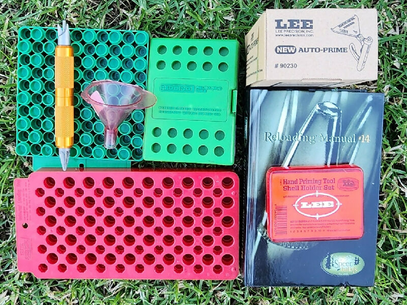 Reloading gear, Redding 223 dies, Speer loading book, Lee hand primer tool & shells holder set to suit, Lyman chamfer and debur tool, 2 x loading trays, powder 
