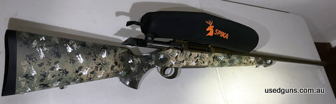 Customised Sauer 100 in 300 Win Mag. Action and barrel has been cerakoted in Burnt Bronze, the stock has been hand painted in a smart looking camo. The rifle co
