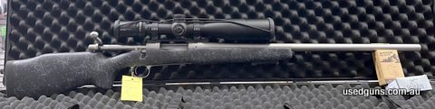 Remington 700 Long Range Stainless, 26 inch heavy barrel, Vortext Strike Eagle 5-25x56 MRAD, floorplate magazine, Leupold rings & rail, bell & Carlson stock.