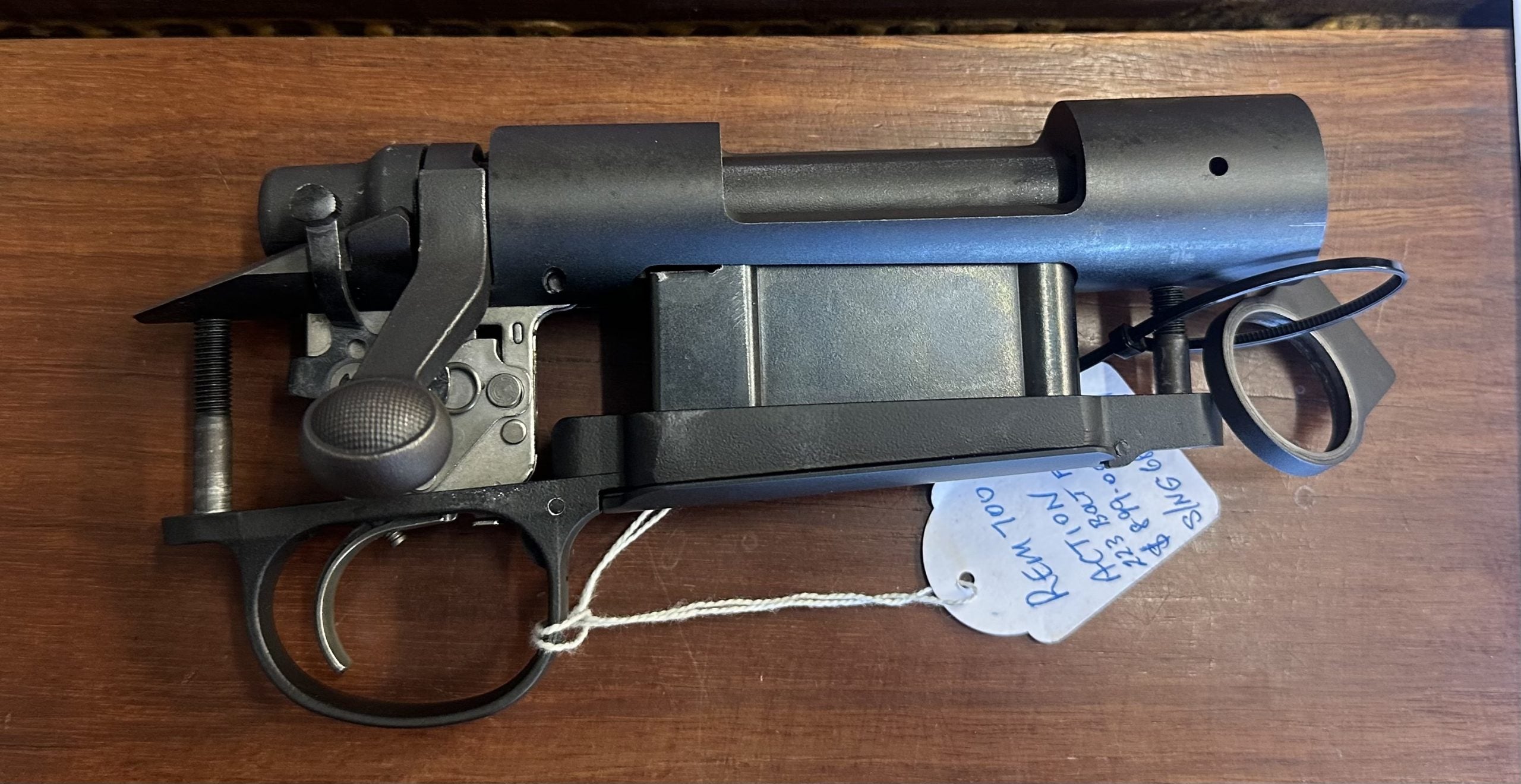 Remington 700 Action, factory trigger,  bottom metal, recoil lug, action screws, 223 bolt face.