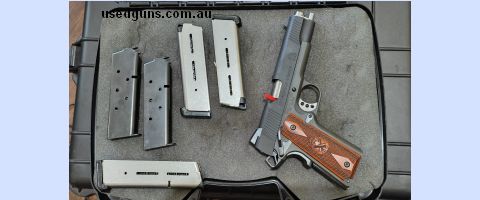 Springfield Armory 1911 Loaded Parkerized. 127mm barrel. 45acp. With 2 original mags and 3 extra wilson combat mags. Hardly used. Free post to your dealer auswi
