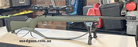 Very few rounds through firearm . 18" Barrel with thread and muzzle brake. Bushnell hunting scope with rings. Harris style bi-pod and leather strap. Two 10rnd m