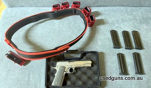 Comes with IPSC belt, red alloy quick holster, 5 red alloy mag holders, 5 magazines and case.