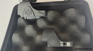 Brand new Trigicon 5moa sight with cover and Mounting plate for a O/R CZ Shadow 2. Buyer pays postage.
