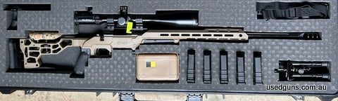 Howa 1500 heavy fluted 24 inch barrel blued. Has fired 102 rounds. (60 barrel run in, 42 sighters. Can ship at buyers expense. Trigger kit, custom brake, MDT ES