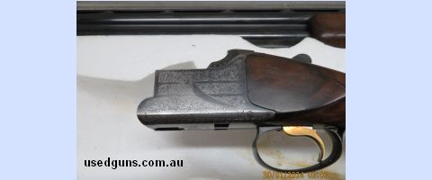Browning BO model trap gun , made in 1979 , medium or 12mm wide rib , 1/2 & full chokes , chrome bores , 14 1/2" lop to original Browning recoil pad , bought th