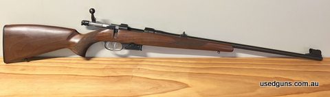 Built in 1990. Double set triggers. Stock is in very good condition with a few small marks. Bluing generally good with a wear mark on underside of barrel, under