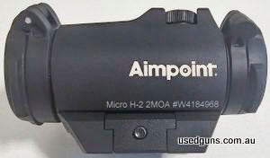 Excellent condition (As new not a mark on it) Aim Point Micro H2 with 2 MOA dot. Comes with new battery, weaver & picatinny rail mount and see through lens caps