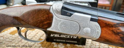Beretta DT10L Trap 30 inch. Has been updated to shoot sporting. Sporters stock and new chokes. Excellent condition exhibiton grade timber. New Beretta factory s
