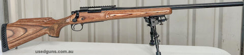 Remington 700 VLS Varmint Laminated Stock. Barrel and action done in black ceracote and black microslick bolt. Barrel Set back and recrowned 23". Worked factory