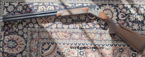 MK38 Trap Gun Adjustable Stock Includes factory flush chokes and 5x Carlson extended chokes Comes cased with original documentation Light scratching to woodwork