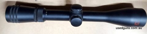Redfeild Revolution 4-12x40 with a standard duplex reticle. Has a 1 inch tube and comes with a lifetime warranty. Is in good condition with a few cosmetic marks