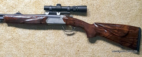 Fabarm Apser 9.3x74R double rifle Engraved Factory Iron fluro sights. Merkel Detachable Mount & Weaver 1-3x20mm Scope C/W Aluminium case.
