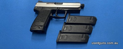 Excellent conidition H&K USP Two Tone 9mm. Comes with 4 magazines total. Threaded barrel. Trigger and hammer crisp. Cycles well.