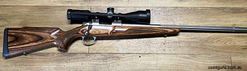 Sako 90 Varmit, stainless, heavy fluted barrel with Zieess Conquest 5-25x50 scope. in excellent condition.