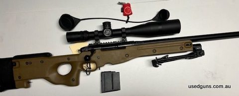 Accuracy International AE Mk.1 rifle paired with a Nightforce NXS 5.5-22x56 scope, along with a clone-correct spigot-mounted bipod. The AE Mk.1 is celebrated fo