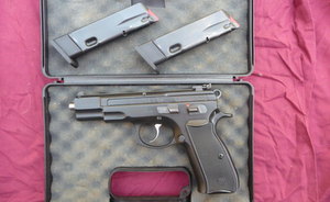 This pistol is the full size 9mm frame, but a factory built .22 conversion. A great trainer gun. Comes with 2 magazines,original case and handbook