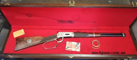 Winchester 1894 John Wayne commemorative in Winchester hard case. Comes with its original box, is unfired and comes with a Winchester hard case. Is in excellent