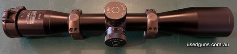 Schmidt and Bender 10 x 42 PMii ST MRAD P3 Mildot reticle. Includes Nightforce steel rings. Owned from new. Prefer text, more photos available.