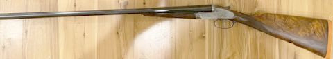 Fully refurbished in UK. 1899, 29 1/2in. nitro chopperlump barrels , 2 3/4in. chambers, bored approx. 1/4 and 3/4 choke, self-opening action, toplever engraved 