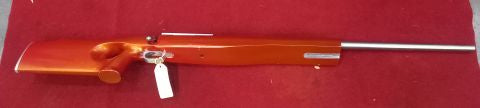 Tikka m55 action,  heavy s/s 30" target barrel chambered in 223. custom 20-30 moa rail 3" timber thumbhole bench rest stock