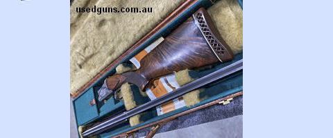 In the original leather case this Browning Trap gun has been well cared for.