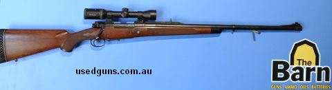 Custom Argentine Mauser 1909 in 458 Win Mag. Open sights, Kahles Helia CT 2-7x36. Lever release floor plate that is very rare. Custom stock that is in very good