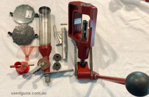 Hornady loading press with Lock N Load bush fitted on press and powder dispenser. comes with primer seating but not sure if it's all there plus powder trickle a