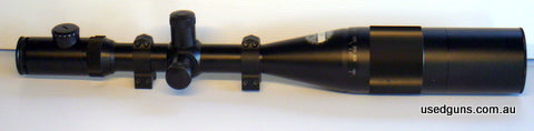 Nightforce 12-42X Benchrest scope for sale, excellent condition, illuminated NP2DD reticle, .125 MOA clicks. With Warne vertical split rings.