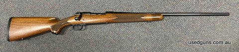 Excellent condition Winchester 70 in 30-06. Last of the American made ones. Classic control round feed. Woodwork in excellent condition an incredible example. $