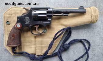 British service revolver with holster and lanyard. Please text for more photographs