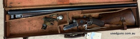 Excellent condition and shows very little use. Bright colour case finish to action and some thinning blue on barrels. Checkering is sharp and clean with mark to