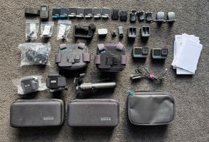 Well over $2000 worth of GoPro gear. Purchased 2 years ago and only used for about 6 hours over 3 days. Includes 2x GoPro cameras (model 10 and 11), 2x double c