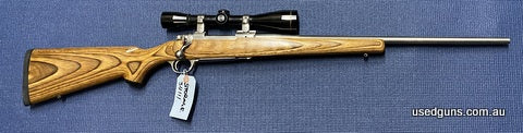 Very good condition Ruger 77 Mk II chambered in 223. Has a Leupold 6x42 scope mounted. Laminated stock in good condition. Cycles well. Great varmint rifle.