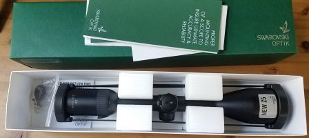 Brand new in box with 4W reticle. Price includes postage.