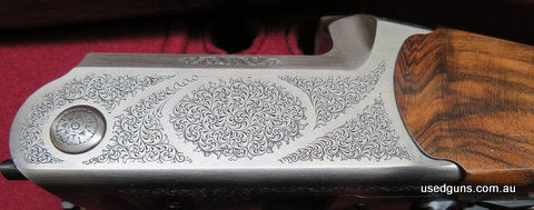 As new Blaser F3 Game Luxus with beautiful engraving, typically superb figure in the stock & forend, 14 3/4" lop with 3/4" pad. Comes cased in a luxury leather 